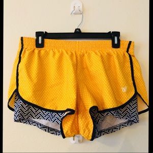 Varsity workout shorts with spandex underlay.